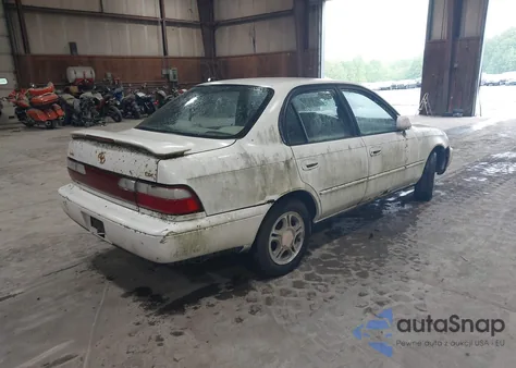 1997 Toyota Corolla Dx z USA, uszkodzony, nr VIN 2T1BB02E3VC181698